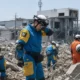 Kumamoto Japan earthquake rescuers heat Aeon mall rubble 2026