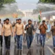 Rahul Gandhi condemns police force Jharkhand student protest march